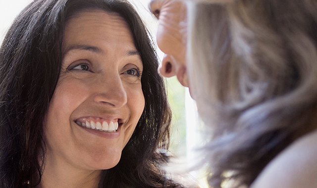 woman laughing with friends