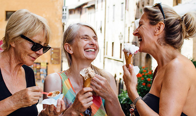 woman elaughing with friends